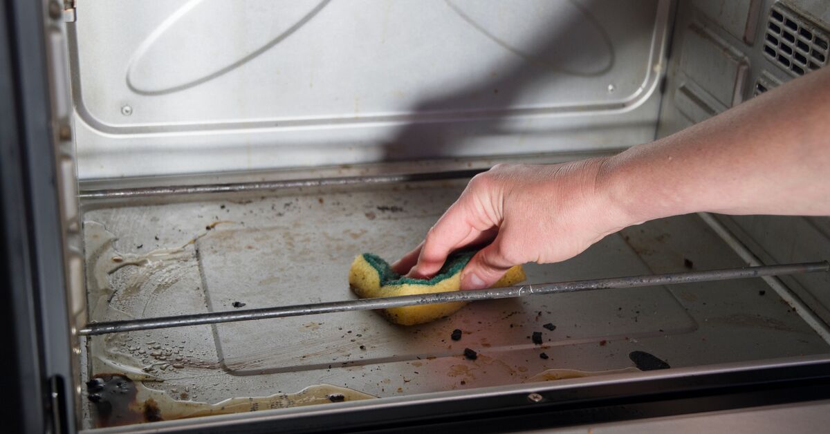 Burnt-on grease coating oven interior.