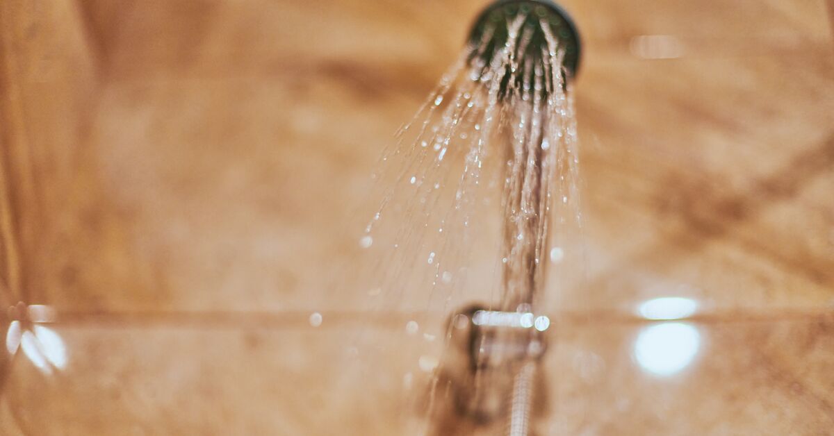 Showerhead with irregular water spray pattern