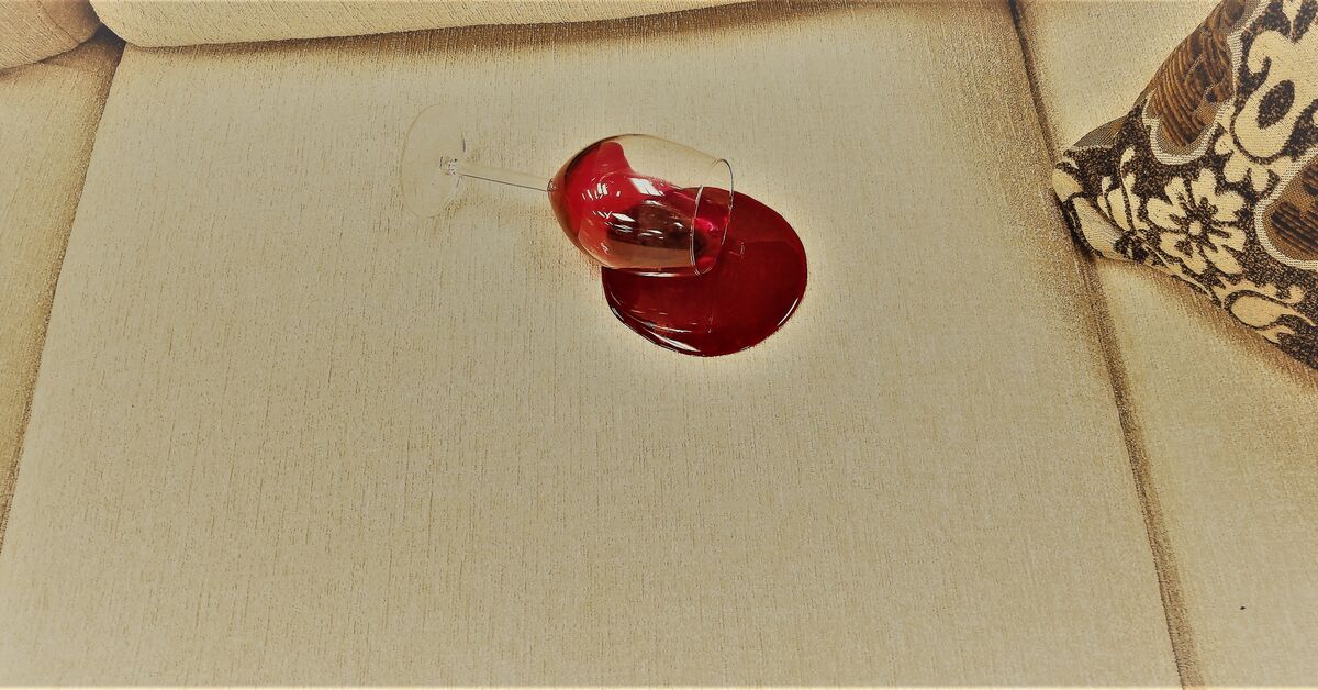 Red wine spill on sofa