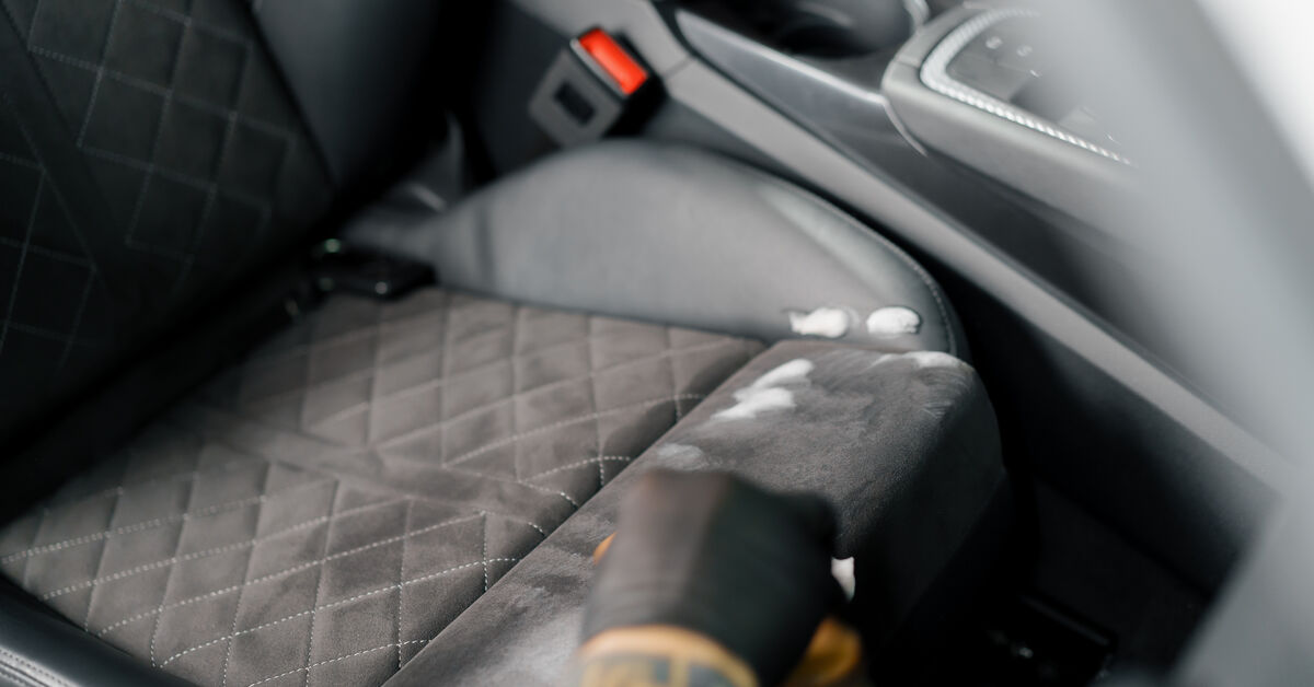 Water stain rings on dark upholstery