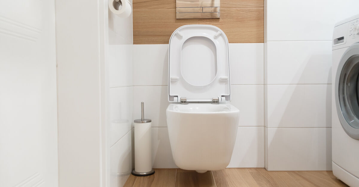 Clean toilet in neat bathroom