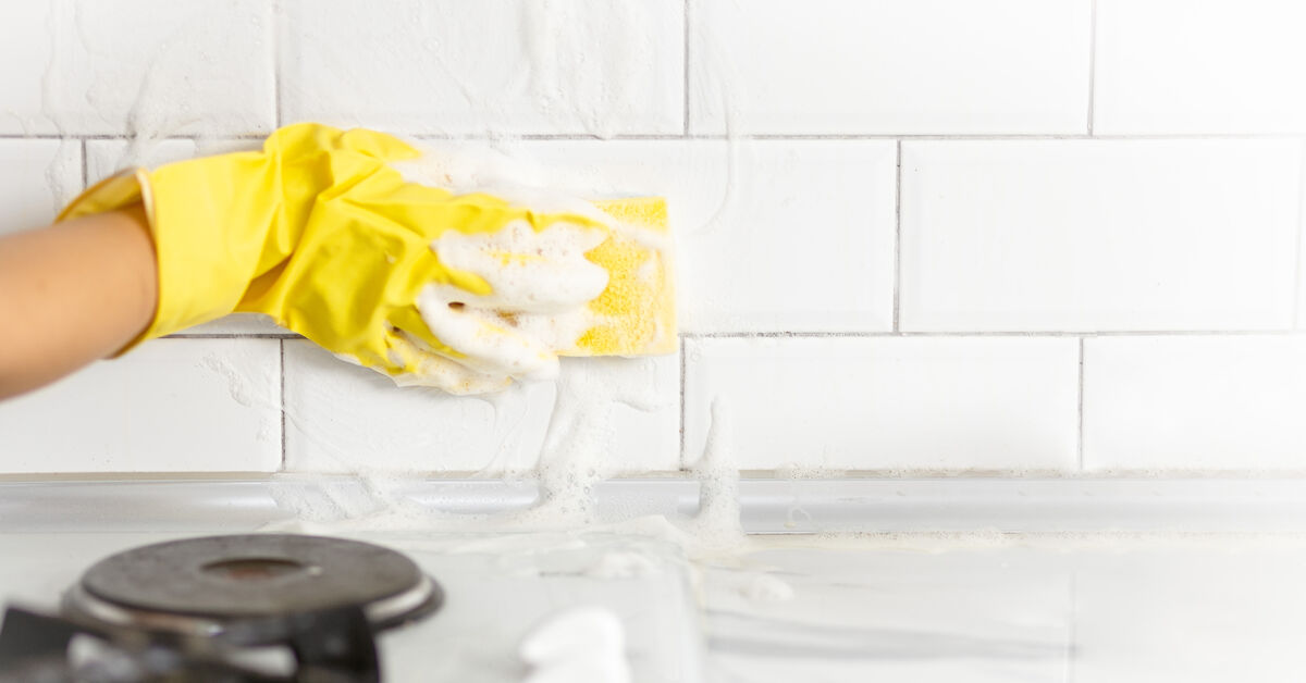 Dirty kitchen tiles with grease splashes