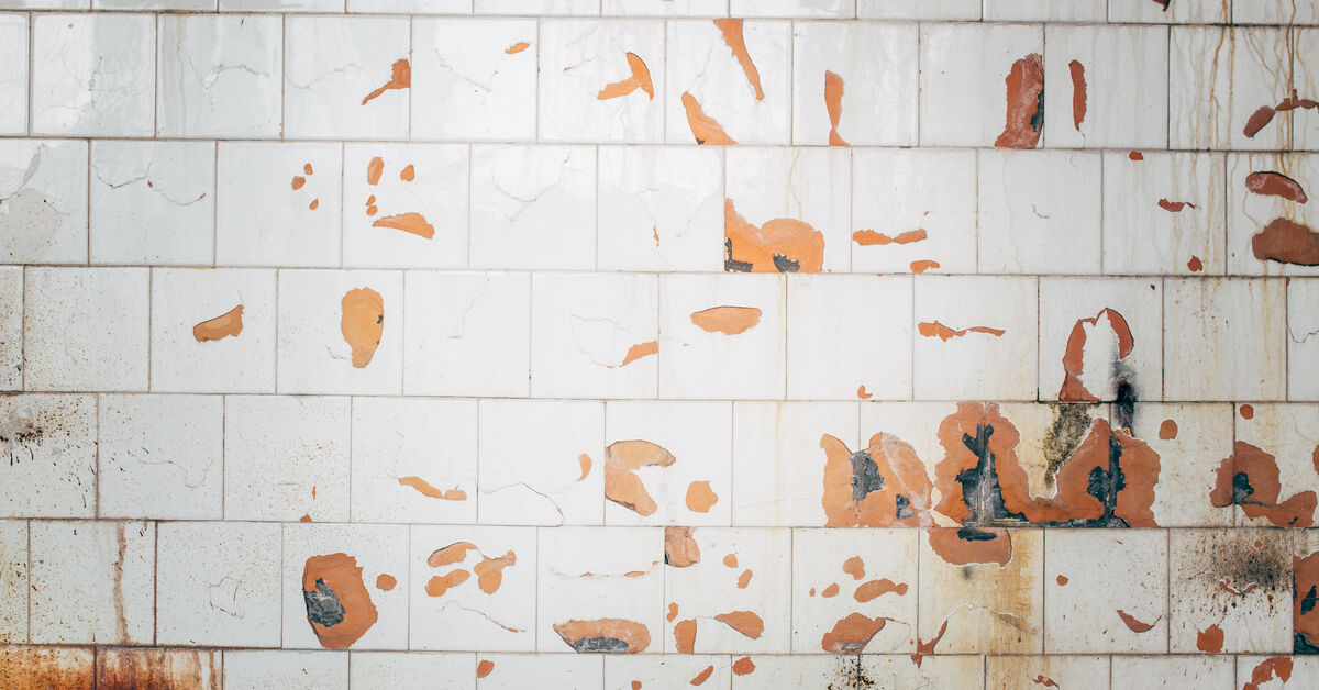 Fresh grease spots on kitchen tile
