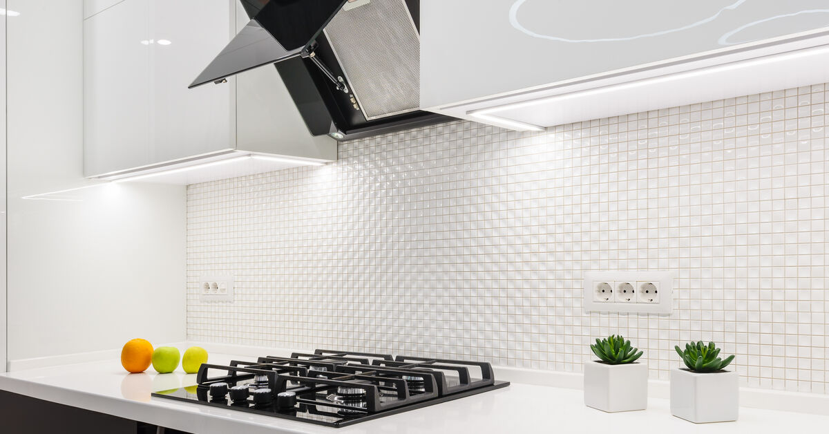 Fresh kitchen tiles and extractor hood