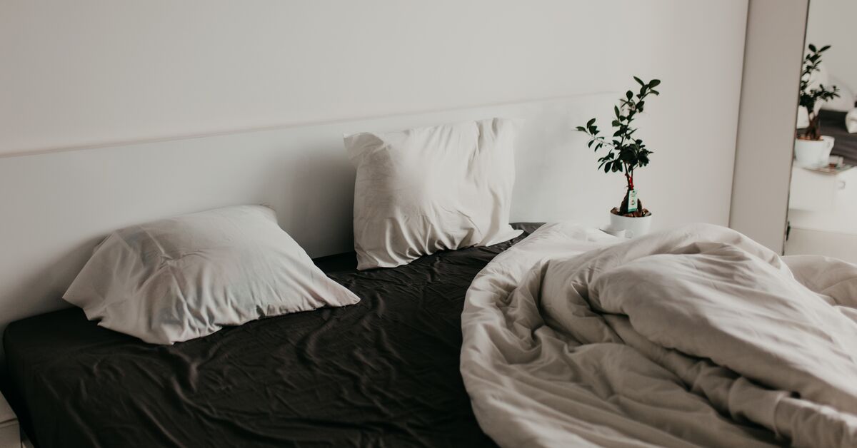Unmade bed in a bedroom